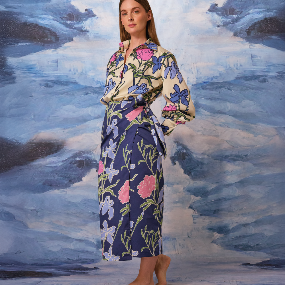 
                      
                        FLORACIÓN MIDI SKIRT
                      
                    