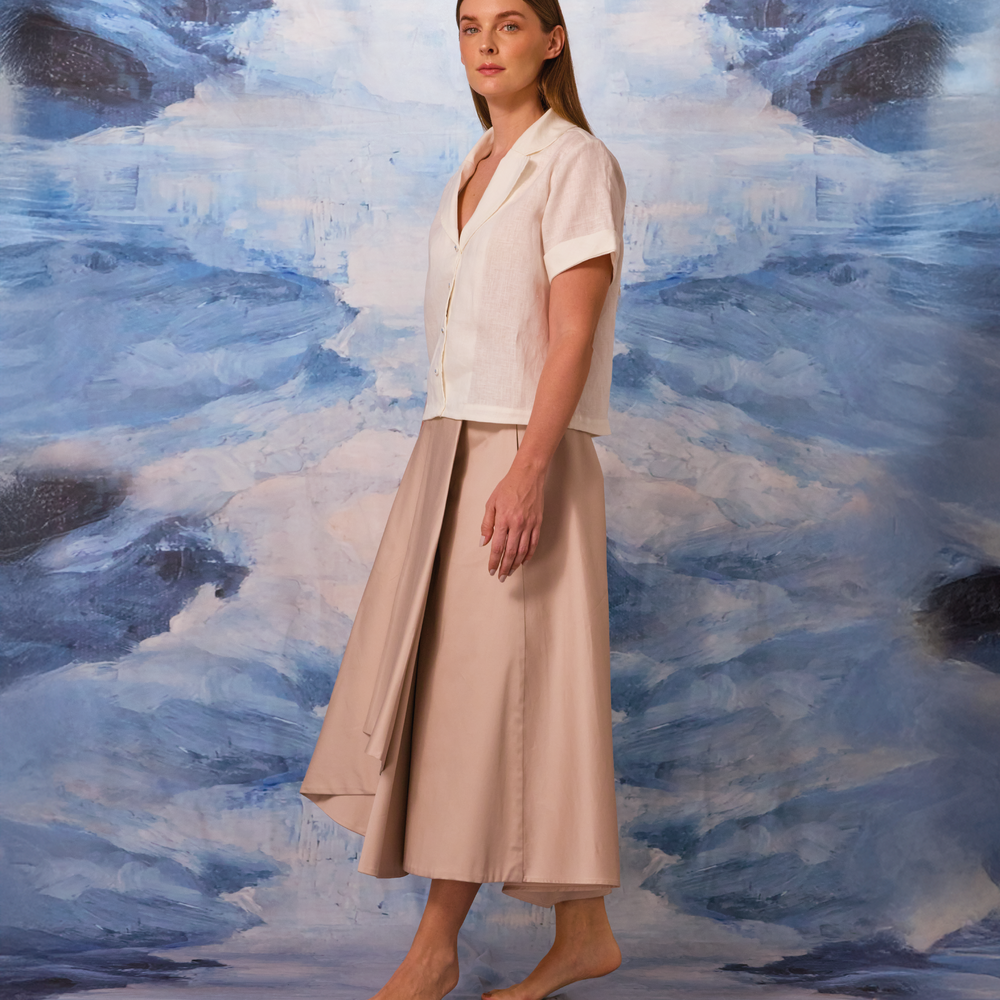 
                      
                        LA RAÍZ MIDI SKIRT - BEIGE
                      
                    