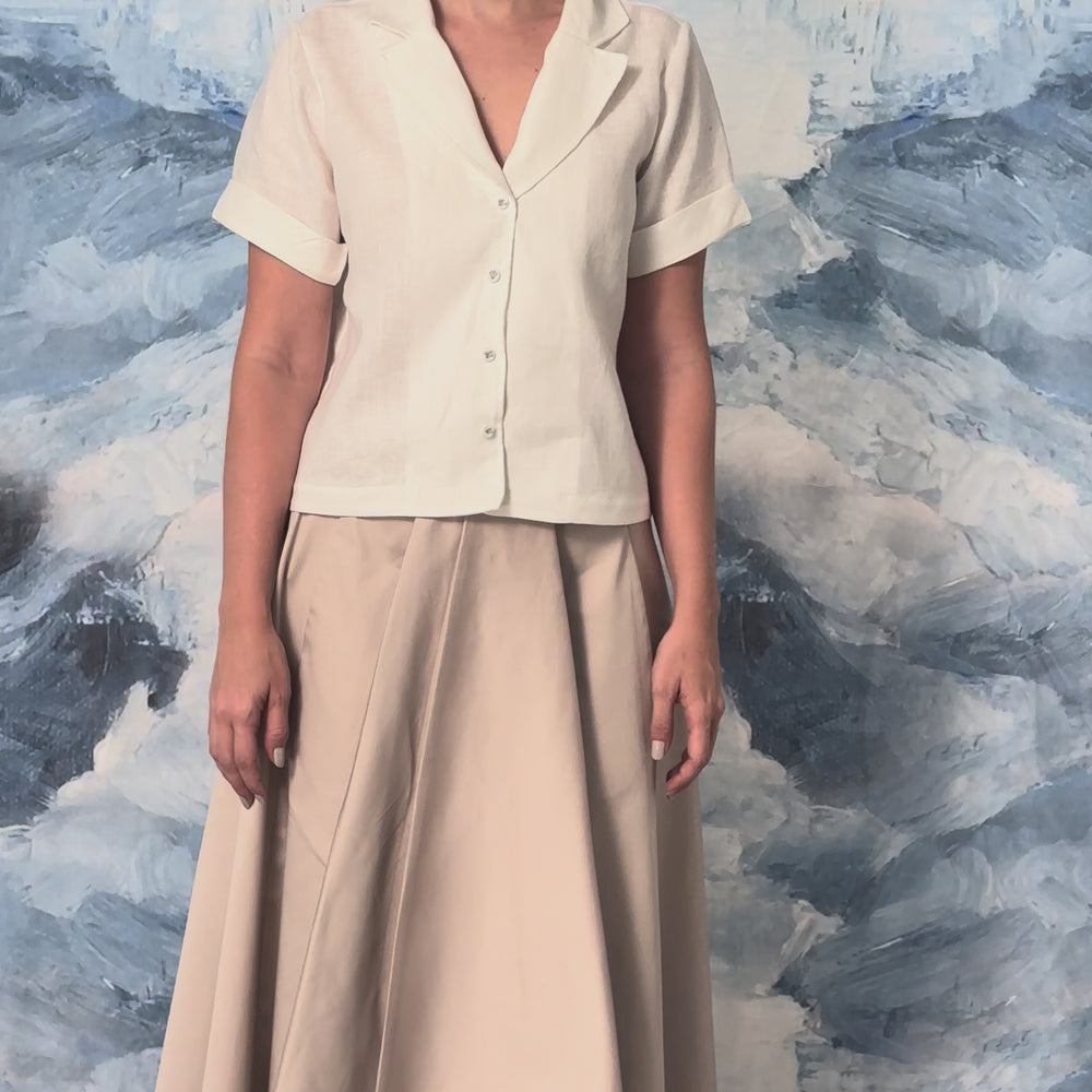 
                      
                        Load and play video in Gallery viewer, LA RAÍZ MIDI SKIRT - BEIGE
                      
                    